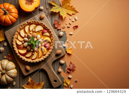 Pumpkin tart with nuts and caramel on rustic wooden board 129664329