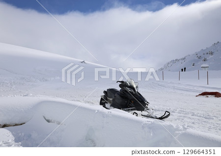 Snowy mountain ski-lift no people, blue sky, azure, air, freshness, ecology. High quality photo 129664351