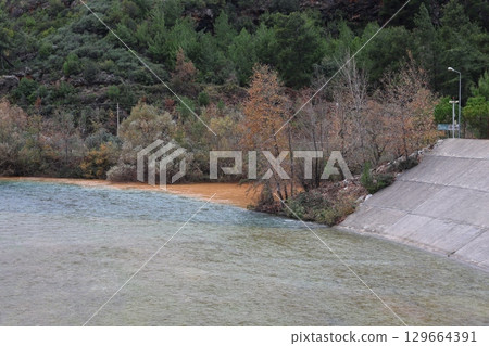 Confluence contrasting rivers. confluence of river unusual nature amazing lands autumn. High quality photo 129664391