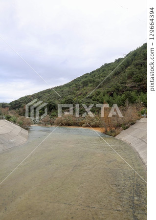 Confluence contrasting rivers. confluence of river unusual nature amazing lands autumn. High quality photo Confluence contrasting rivers. confluence of river unusual nature amazing lands autumn. High quality photo 129664394