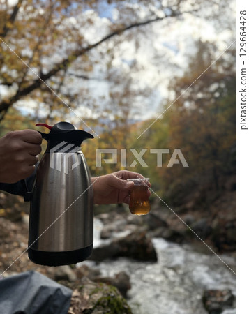 Seaside picnic thermos. High quality photo 129664428