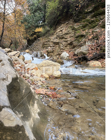 mountain river fast for waterfall rapids stream autumn. High quality photo mountain river fast for waterfall rapids stream autumn. High quality photo 129664438