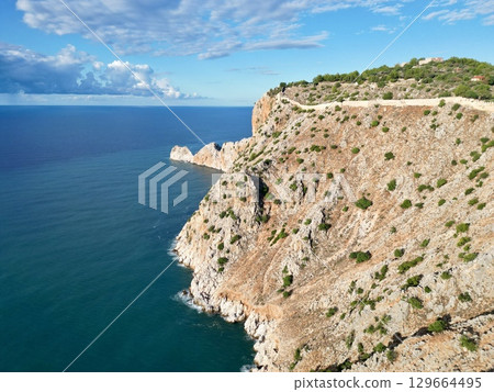 fortress on a rock near the sea coast 129664495
