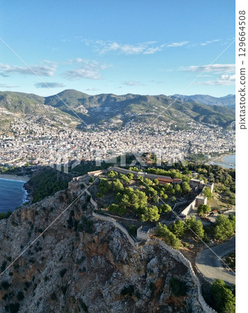 fortress on a rock near the sea coast 129664508
