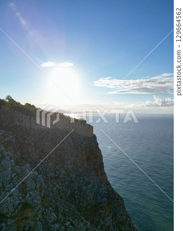 fortress on a rock near the sea coast 129664562
