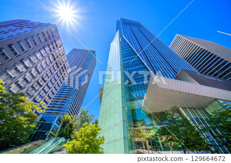 Tokyo cityscape, Japan, August 15th. View of Toranomon Hills and other landmarks. A ray of hope for a new era. 129664672