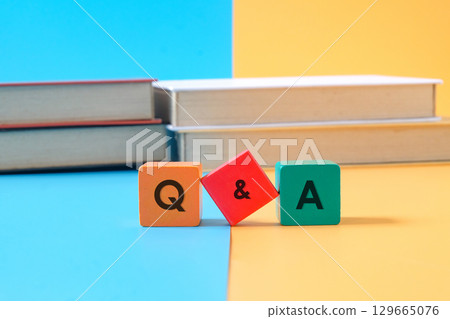 Wooden cube with Q and A text on background,Q and A concept. Wooden cube with Q and A text on background,Q and A concept. 129665076