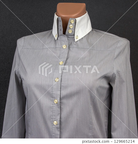 Stylish gray striped dress shirt with white collar and button-up design for formal wear Stylish gray striped dress shirt with white collar and button-up design for formal wear 129665214