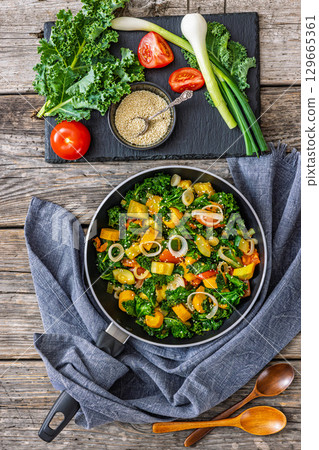 zucchini kale tomato saute sprinkled with sesame zucchini kale tomato saute sprinkled with sesame 129665361