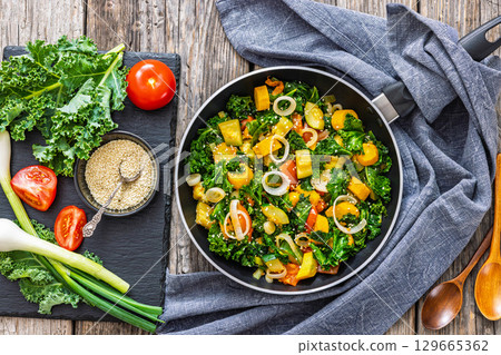 zucchini kale tomato saute sprinkled with sesame zucchini kale tomato saute sprinkled with sesame 129665362