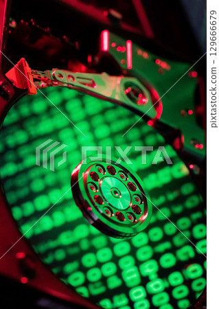 On the hard disk, the binary code is displayed in green numbers On the hard disk, the binary code is displayed in green numbers 129666679