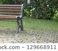 Park Bench and Rain Droplets 129668911