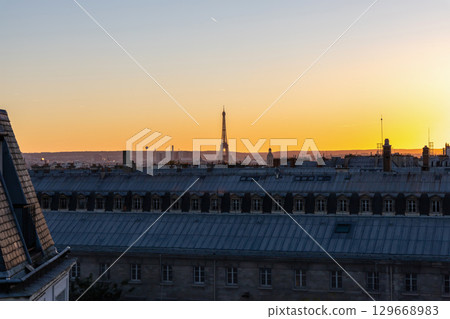 Skyline of Paris by sunset with Eiffel Tower Skyline of Paris by sunset with Eiffel Tower 129668983