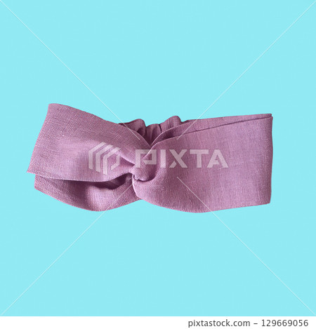 Purple women's headband on a blue background. 129669056