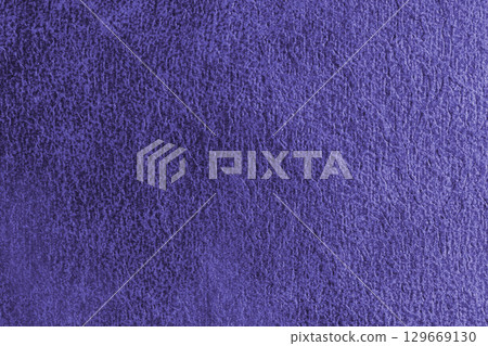 Close up, macro structure of purple suede fabric with abstract embossed shabby, messy texture. 129669130
