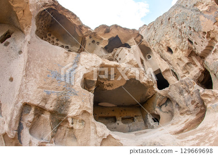 Cappadocia, Turkey features unique rock formations and ancient cave dwellings 129669698