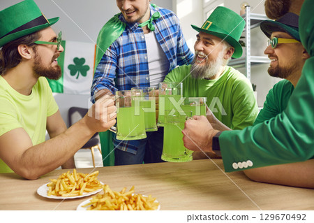 Group of happy friends celebrating St. Patrick day together 129670492