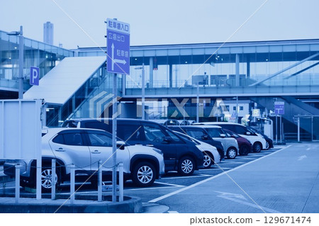 Early morning, parking lot in front of the station Early morning, parking lot in front of the station 129671474