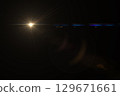 Lens flare, light effect on black. 129671661
