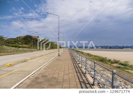 Road along the Mekong River from Nakhon Phanom in northeastern Thailand / Nakhon Phanom, Thailand 129671774
