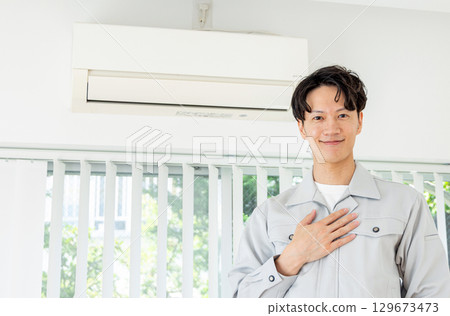 Air conditioner inspection worker 129673473
