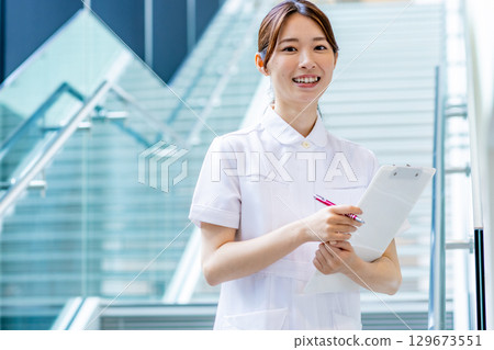 Young nurse working in a hospital Young nurse working in a hospital 129673551