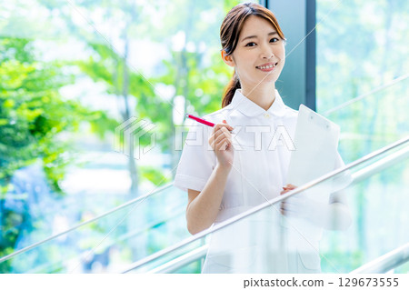 Young nurse working in a hospital 129673555
