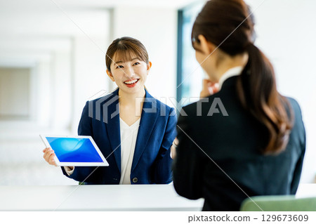 Young woman in a suit interview 129673609