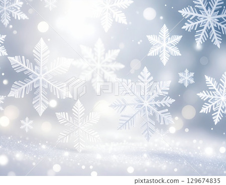 冬季背景插圖：白色和銀色的雪花在柔和的燈光下翩翩起舞 129674835