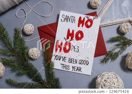 Craft Christmas greeting card holiday present. Tactile hand-on activity. Creative me-made gifts. Seasonal domestic life micro moment hobby 129675428