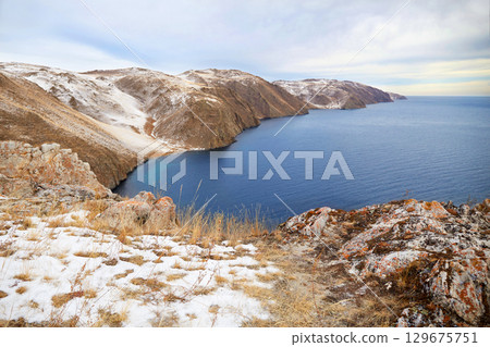 Lake Baikal, Aya Bay in December. Open water in the lake. Lake Baikal, Aya Bay in December. Open water in the lake. 129675751