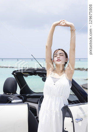 cute woman driving a car cute woman driving a car 129675808