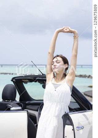 cute woman driving a car cute woman driving a car 129675809