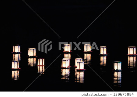 Lanterns floating on the water Kasagi Lantern Floating Festival 129675994