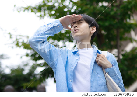 Young men walking in the city Young men walking in the city 129676939