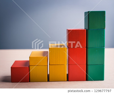 A bar graph made of colorful building blocks 129677797