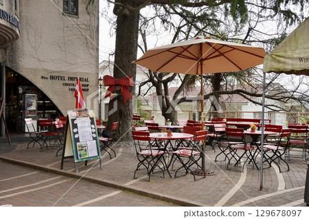 Scenery with red umbrella Scenery with red umbrella 129678097