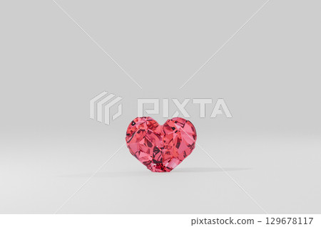 A glass heart falls to the floor and breaks A glass heart falls to the floor and breaks 129678117