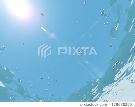 The sun seen from underwater and the sparkle on the water surface 129678290