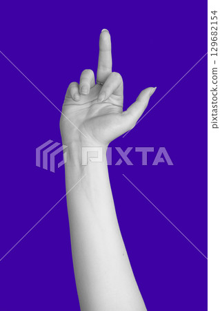 Abstract hand gesture of showing middle finger in air 129682154