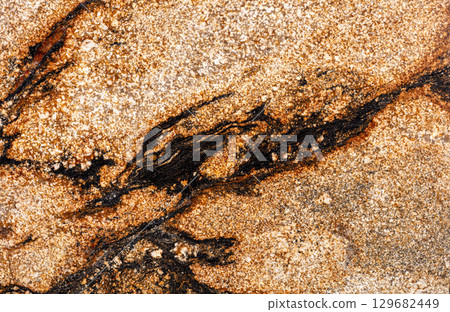 New Sedna - granite background, texture in ideal gold tone for your individual interior project. 129682449
