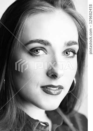 Beautiful woman with make-up close-up studio portrait Beautiful woman with make-up close-up studio portrait 129682458