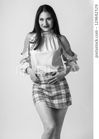 Fashion studio portrait of beautiful woman Fashion studio portrait of beautiful woman 129682529