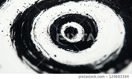 Abstract background Abstract spiral pattern with concentric black lines on white background, creating striking visual effect that draws eye inward 129683384