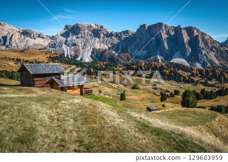 Cute chalets with view in Dolomites, Italy Cute chalets with view in Dolomites, Italy 129683959