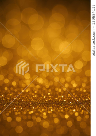 Glistening Gold Glitter Field With Warm Glow 129684115