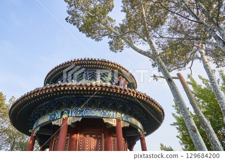 Traditional Chinese pavilion with intricate roof design in Jingshan park in Beijing, China 129684200