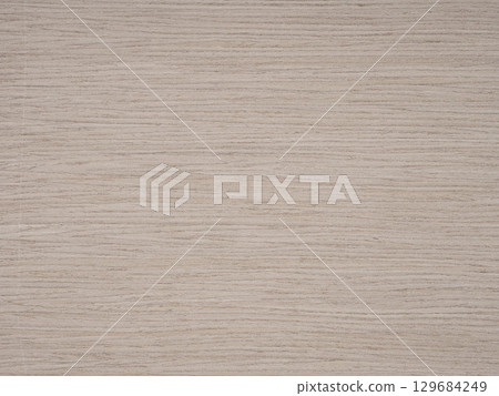 White oak veneer graced with gentle grain patterns, whispering in hues of soft beige and muted cream 129684249