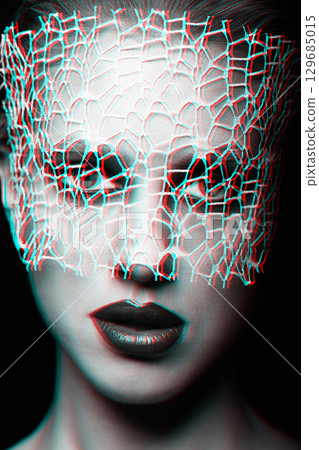 Beautiful woman with fancy make-up and abstract face mask studio portrait in RGB color split effect style 129685015