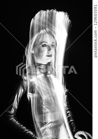 Abstract woman studio portrait with light painting technique 129685091